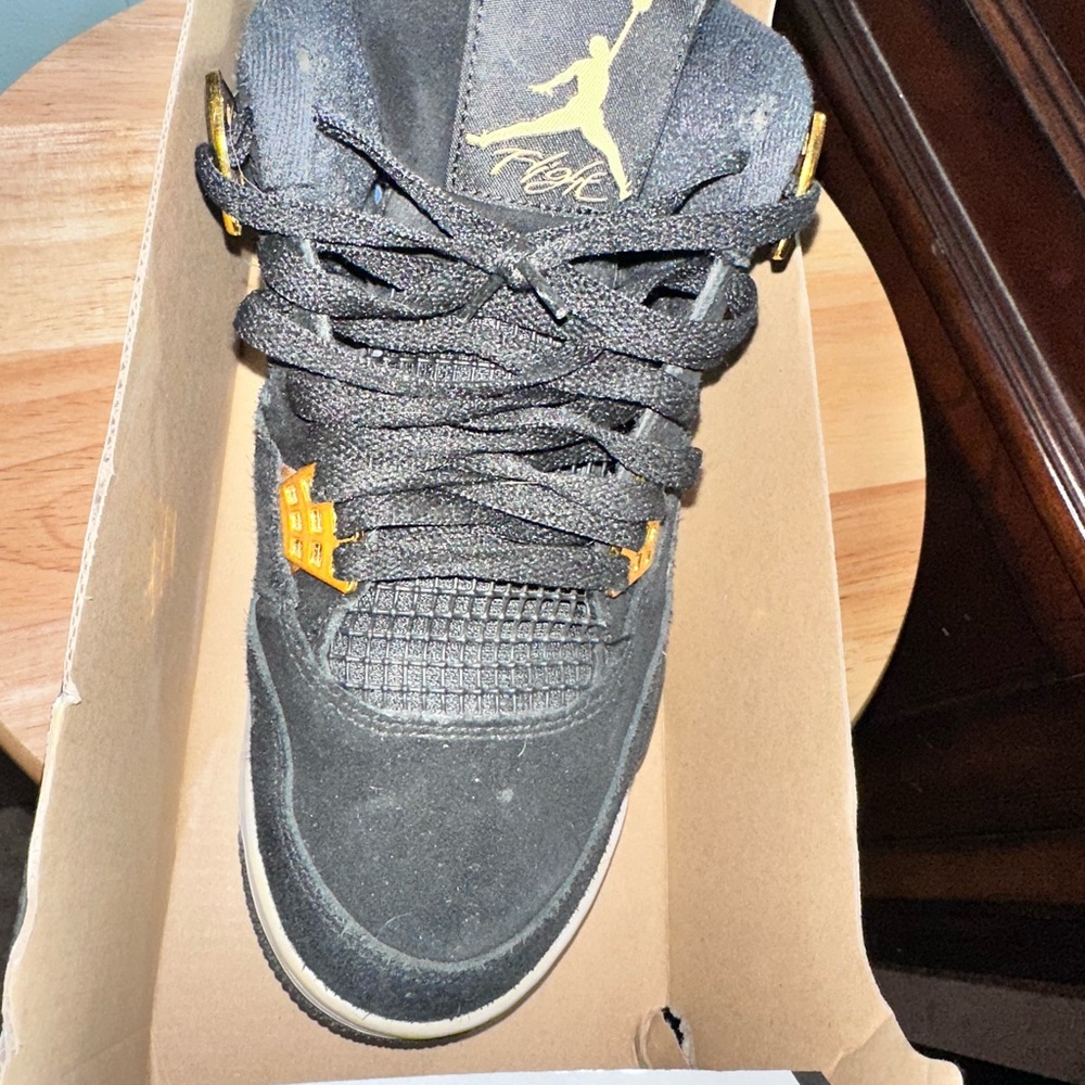 Jordan 4 Black and Gold Athletic Shoes